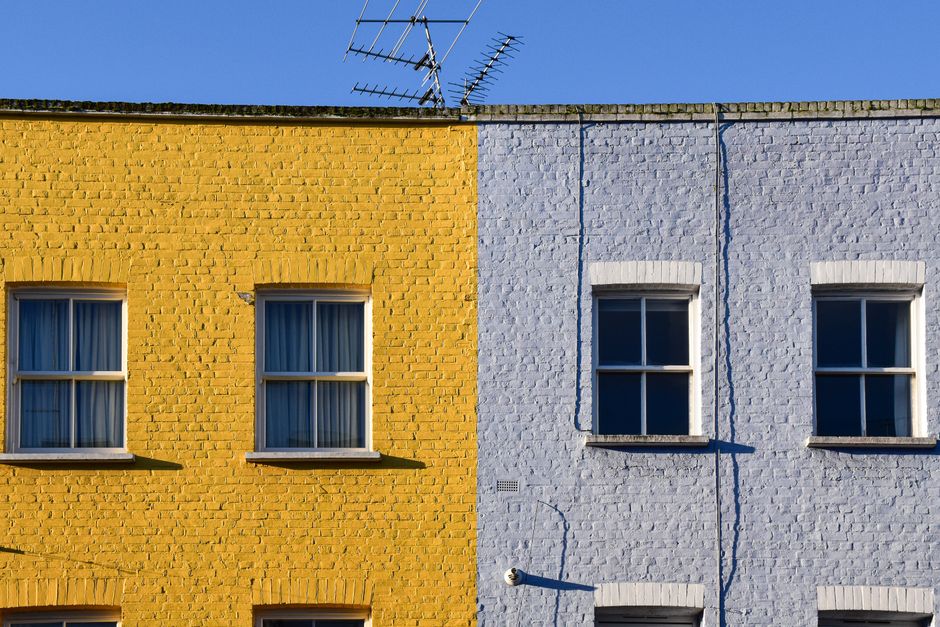 Row of painted houses with brightly coloured walls